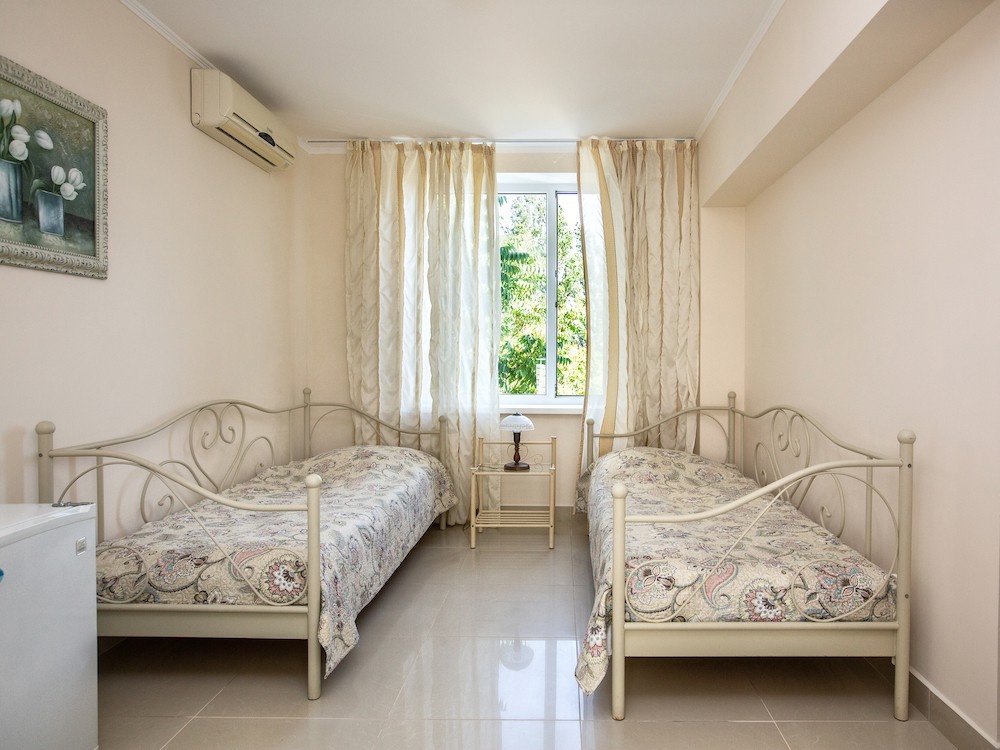 Стандартный номер 2-местный с двумя отдельными кроватями и террасой